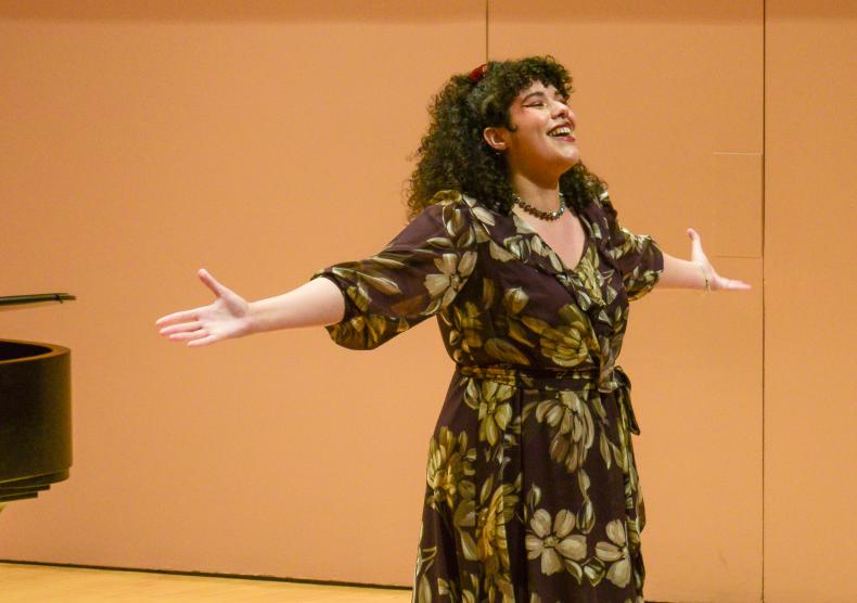Student singing aria in Duncan Recital Hall