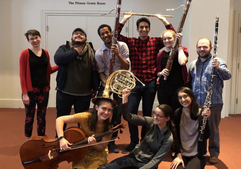 Students celebrating after a successful Just for You Music Program performance