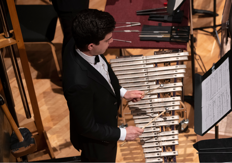 Percussion student playing during a Shepherd School Symphony Orchestra concert