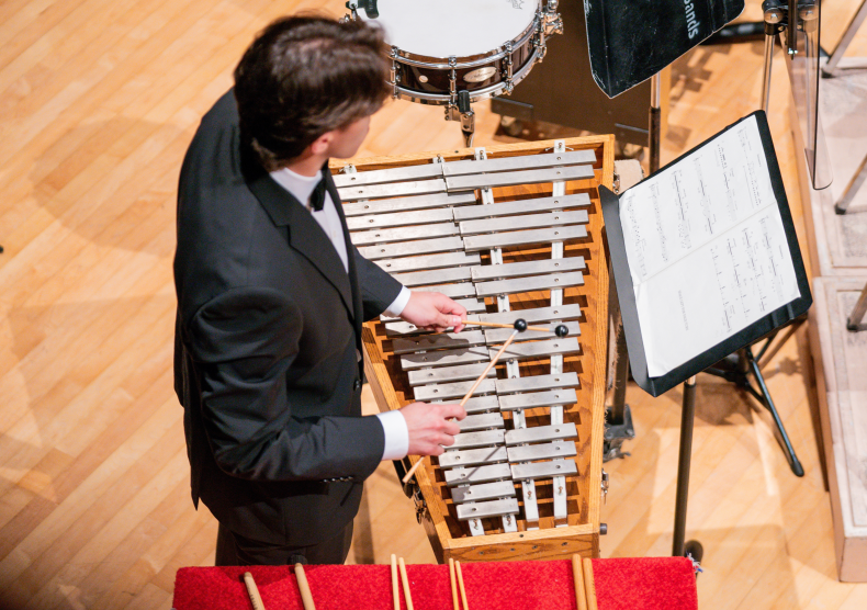Percussion student playing during a Shepherd School Symphony Orchestra concert
