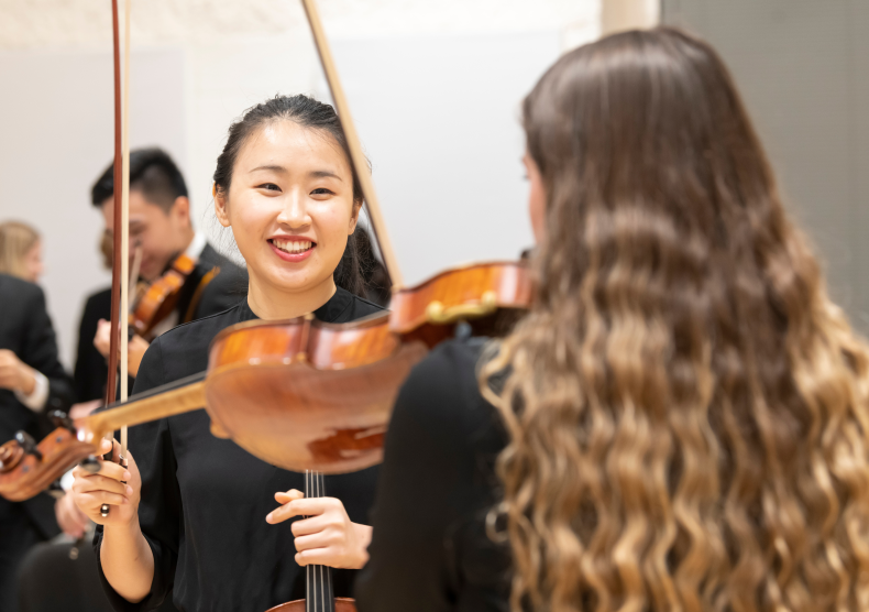 Shepherd School of Music student backstage during a concert intermission