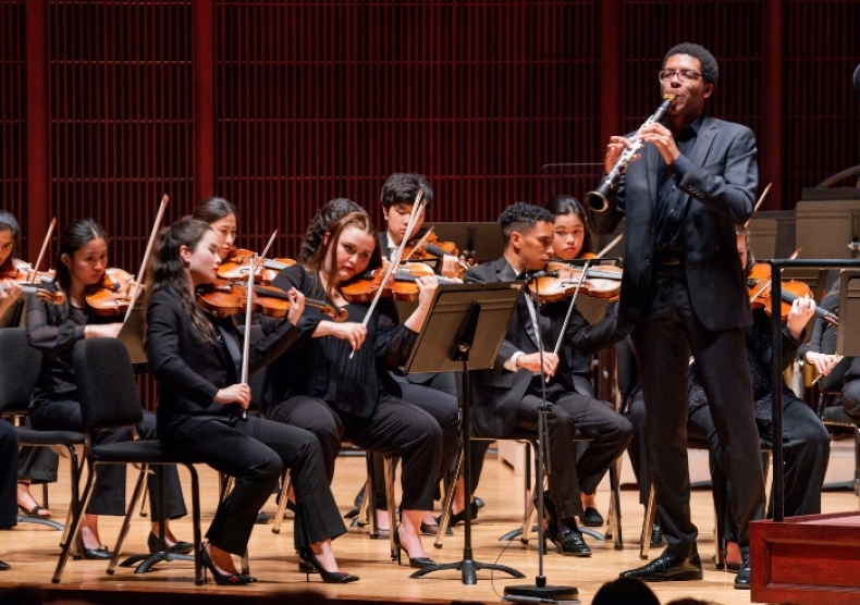 Najee Greenlee playing clarinet with the Shepherd School Symphony Orchestra in April 2024