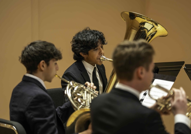 Tuba player performing with brass quintet in Duncan Recital Hall