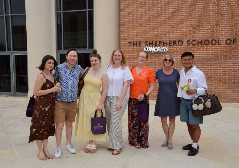 Shepherd opera students smile for a photo at the end of year picnic
