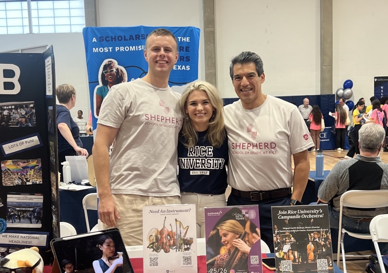 Student conductors with Miguel Harth-Bedoya at a college fair
