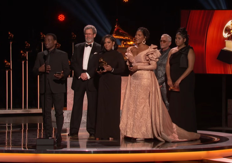 A group of 6 award-winners accept Grammy on-stage