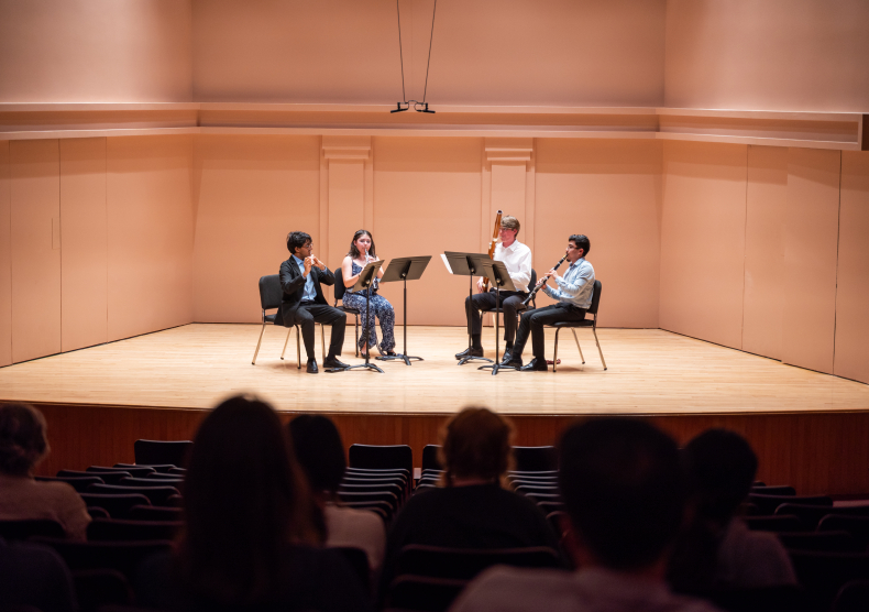 A wind quartet performs in Duncan Recital Hall