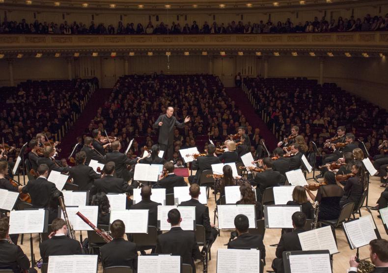 Larry Rachleff directs the Shepherd School symphony orchestra during its 2014 Carnegie Hall debut. Photo credit: Jennifer Taylor.